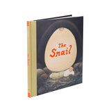 Book titled 'The Snail' with a cover illustration of a man under a paper lantern.