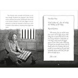 Illustration of a man writing in prison with text on a separate sheet.