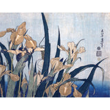 Traditional Japanese woodblock print of irises with a blue and white background