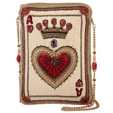Decorative handbag with a heart and crown design on a beige background