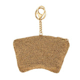 Gold beaded coin purse key chain with a chain strap on a white background