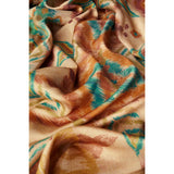 A draped piece of lightweight fabric with an abstract brushstroke pattern in warm brown, teal, and soft pink on a cream base.