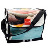 Multicolored bag with a visible brand label on a white background