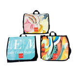 Three bags with artistic designs and 'PEM' branding on a white background