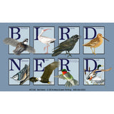 A square printed design featuring the word BIRD Nerd spelled out in large letters, each paired with a different bird illustration. The layout includes bobwhite, ibis, raven, dowitcher, Nuthatch, eagle, ruby-throated hummingbird, and duck on a muted blue-gray background.