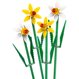 Model of flowers made from interlocking plastic bricks on a white background