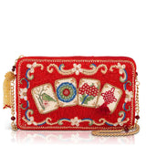 A red beaded clutch purse featuring four beaded mahjong tile designs on the front, gold-tone chain straps, and a gold tassel, shown on a white background.