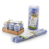 Set of candles with packaging on a white background