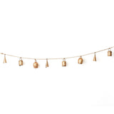Decorative string of gold bells on a white background