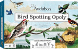 Front and spine of the Audubon Bird Spotting Opoly Collector's Edition board game box, featuring detailed vintage-style bird illustrations over a lake and forest scene.