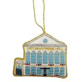Embroidered ornament of East India Marine Hall with blue windows and gold accents on a white background. Reverse is embroidered with 'Salem' in gold lettering.