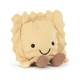 Plush toy ravioli with a smiling face on a white background