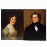 Two rectangle magnets with portraits of a woman and a man from the 19th century. The woman is on the left and the man on the right.