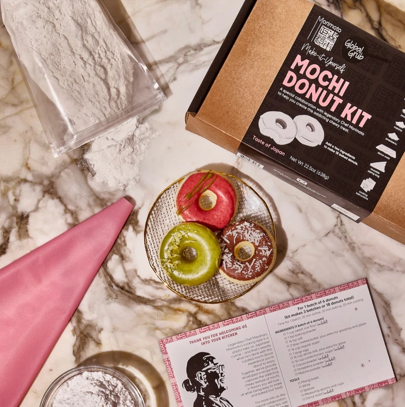 Mochi donut kit with ingredients and instructions on a marble surface