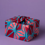 Japanese wrapping cloth in geometric patterns of pinks and aqua