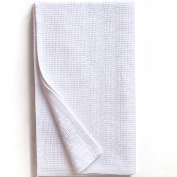 White textured towel on a white background