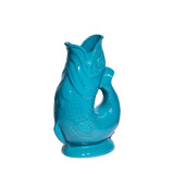 Turquoise ceramic fish-shaped vase pitcher on a white background