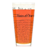 Pint glass with text design on an orange background