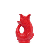 Red ceramic fish-shaped vase pitcher on a white background
