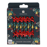 Talking Tables Saucer Crackers in a dark navy blue box decorated with yellow pears, green leaves, and red berries, with the crackers visible through a clear window.