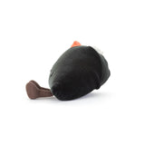 Stuffed toy resembling a sushi roll with black exterior, orange and green fillings on a white background
