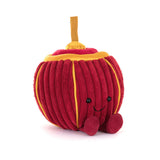 Red Chinese lantern plush toy with yellow accents on a white background.