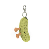 Green textured pickle keychain with a smiley face on a white background