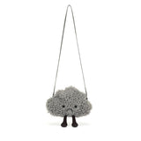 Plush cloud-shaped bag with a sad face on a white background
