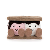 Plush toy resembling a s'more with marshmallows and chocolate on a white background