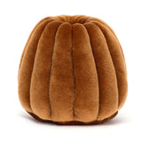 Brown plush toy on a white background