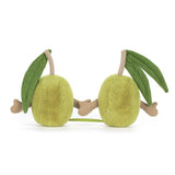 Plush toy shaped like an olive with green leaves on a white background