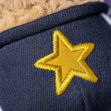 Navy blue fabric with a yellow embroidered star