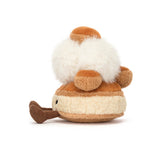 Plush toy resembling a pastry with a white beard on a white background