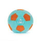Plush toy resembling a soccer ball with orange panels on a white background