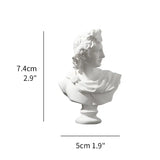 White classical bust with measurements on a white background
