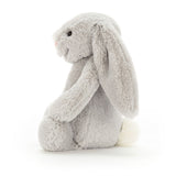 Plush gray bunny toy on a white background