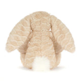 A plush stuffed bunny in a light beige faux fur material with a contrasting white fluffy tail, shown from the back on a white background.