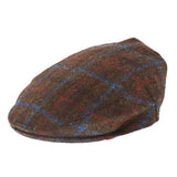Harris Tweed  wool flat cap in brown, red and blue tartan