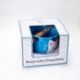 A blue cat-themed bowl with chopsticks inside a white and light blue gift box, labeled 'Bowl with Chopsticks'.