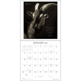 A January 2027 wall calendar page featuring a black-and-white goat portrait at the top with a quote, above a full-month calendar grid.