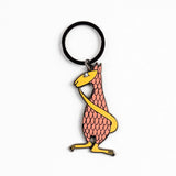 A novelty keychain featuring a stylized  charm with a pink and orange scalloped pattern, yellow outline details, and a black metal key ring, shown on a plain white background.