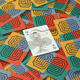 Colorful geometric-patterned cards with a central card featuring a dancer design.