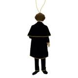 Decorative ornament of a person in a black robe with a gold trim on a white background
