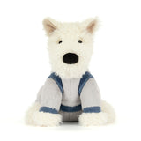 White plush dog with a blue space suit on a white background