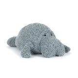 Plush toy Manatee with textured surface on a white background