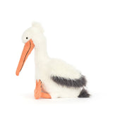 Plush pelican toy with a white body, orange beak, and feet on a white background