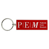 Red rectangle silicone keychain with metal ring and text.