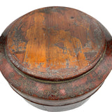 Vintage Chinese basket crafted of wood with a bamboo handle. Painted red with faded imagery.