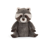 Plush raccoon toy on a white background