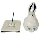 Ceramic rabbit-shaped incense burner with a square base on a white background